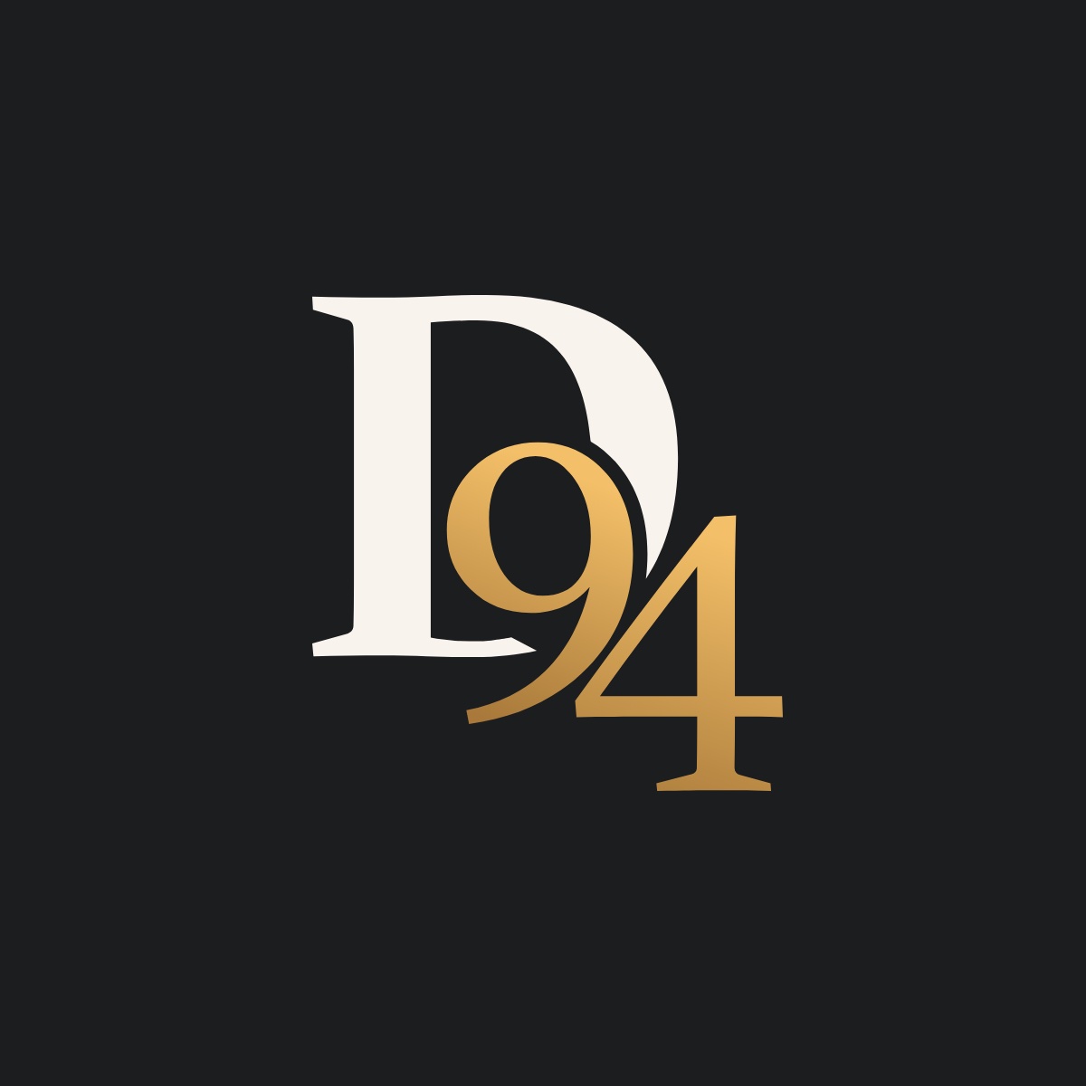 The D94 monogram: a cream D with a gold 94, on charcoal